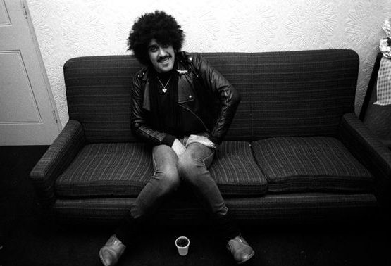 Phil Lynott on sofa - credit Denis O'Regan